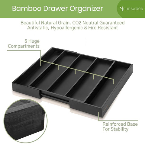 Purawood expandable compartments in use keeping flatware and gadgets neatly organized.