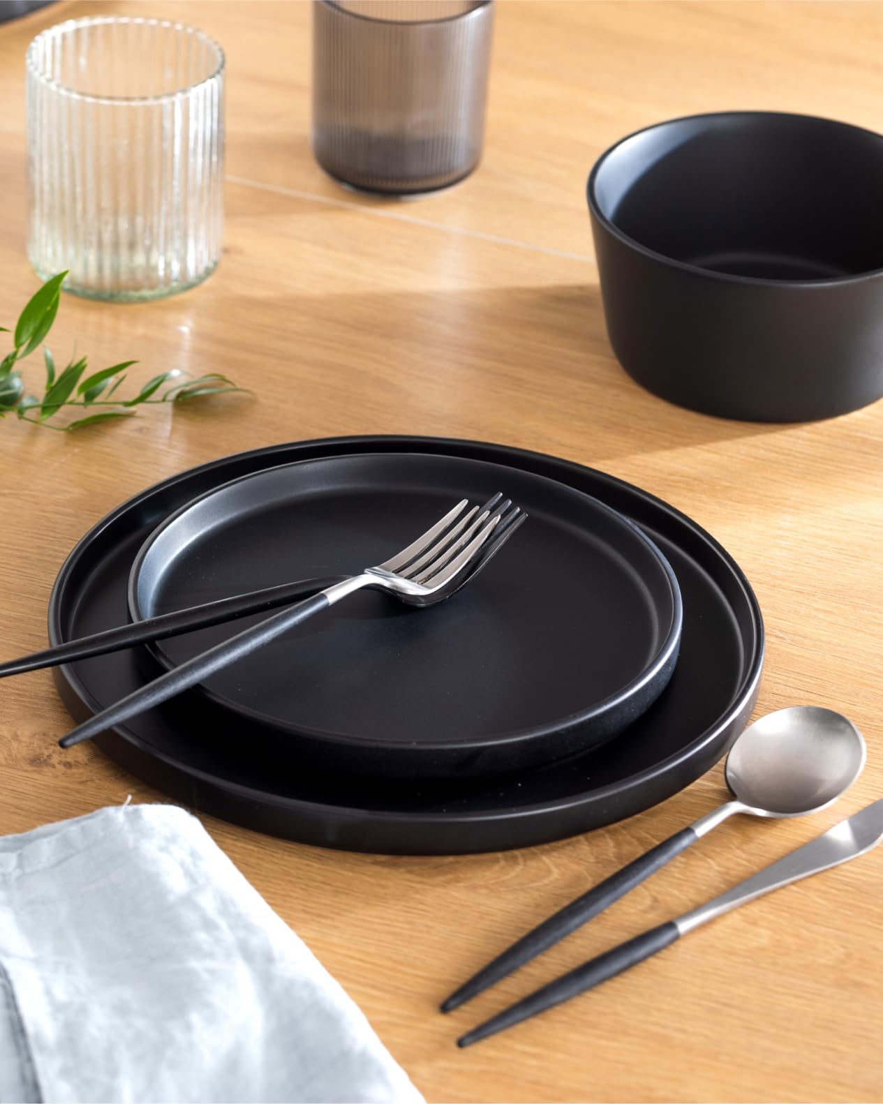 Pure Living salad plate in matte black enhances fresh presentation