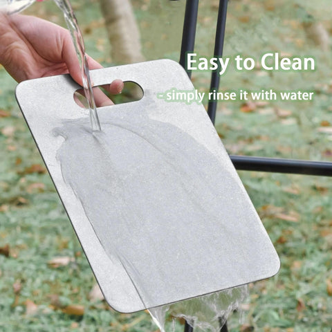 Pure Titanium Cutting Board handle detail showing portable design for easy transport.