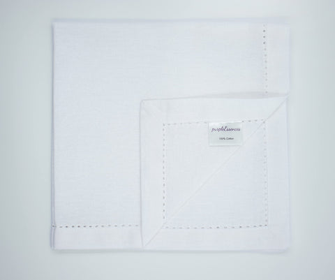 PurpleEssences white napkins ready to mix with colorfully coordinated tableware and decor.