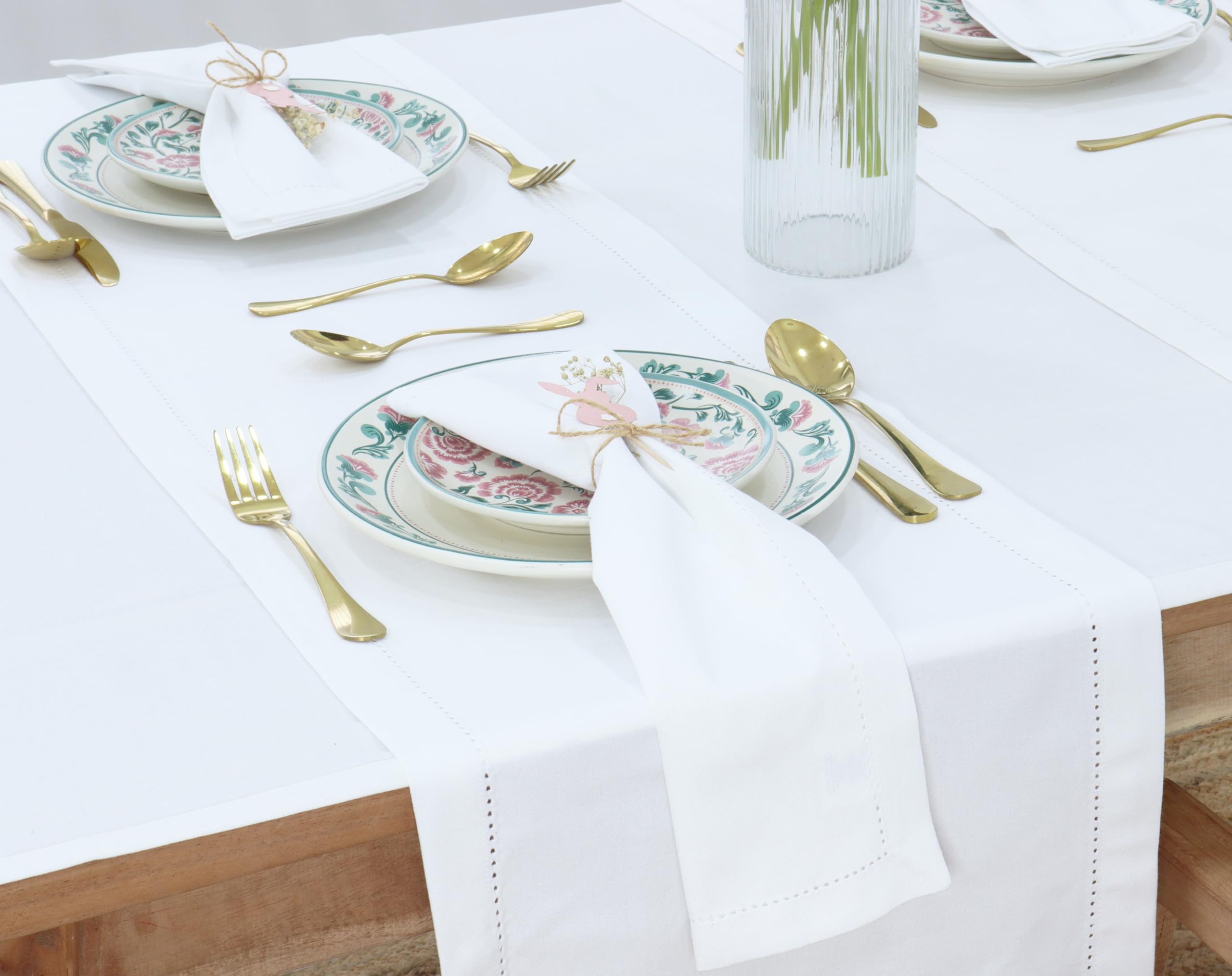 PurpleEssences napkins folded on a table demonstrating crisp edges for weddings.