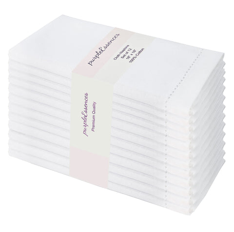 PurpleEssences napkins hemstitch closeup in pristine white for elegant table settings.