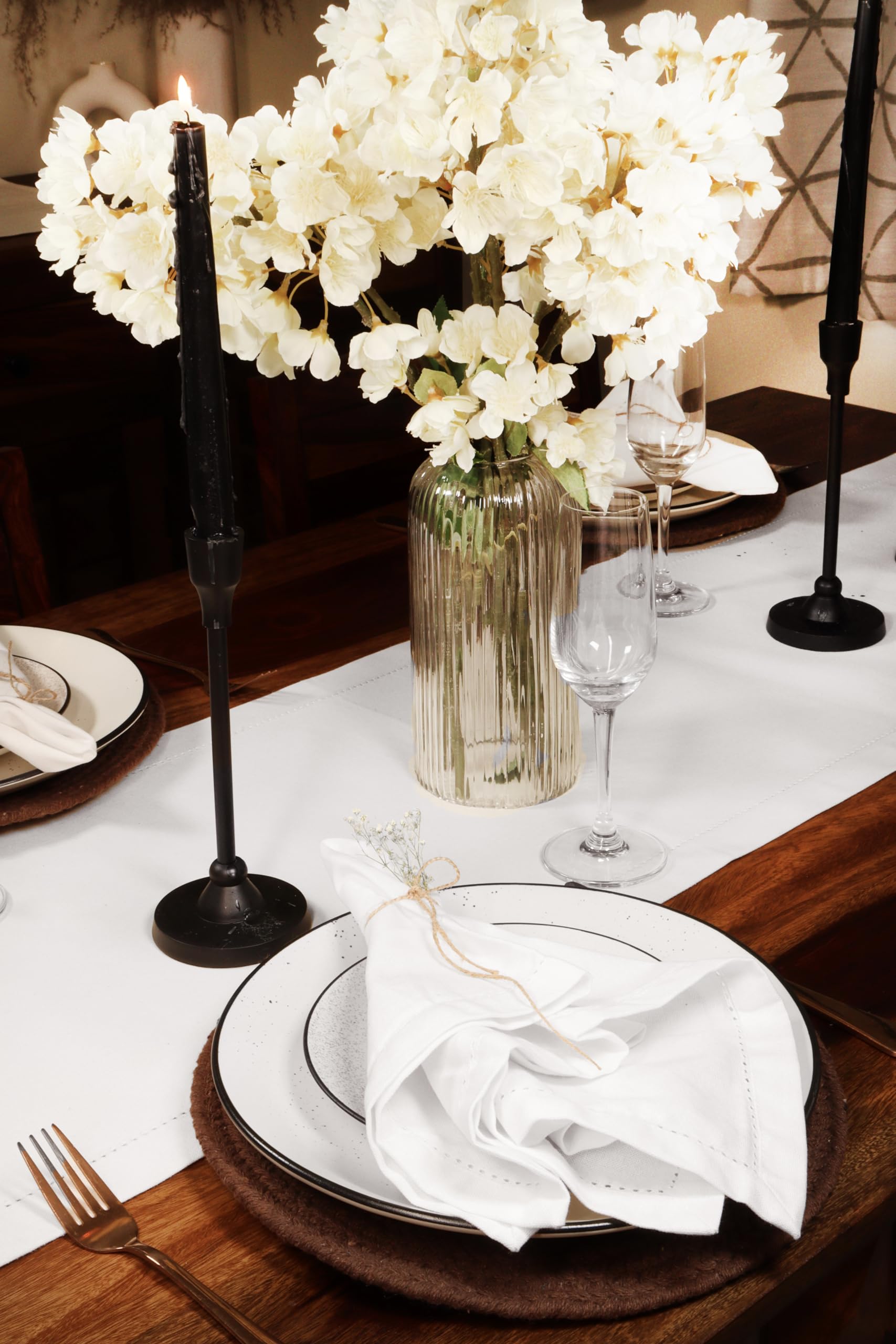 PurpleEssences napkins mitered corners add refined detail to formal table linen.