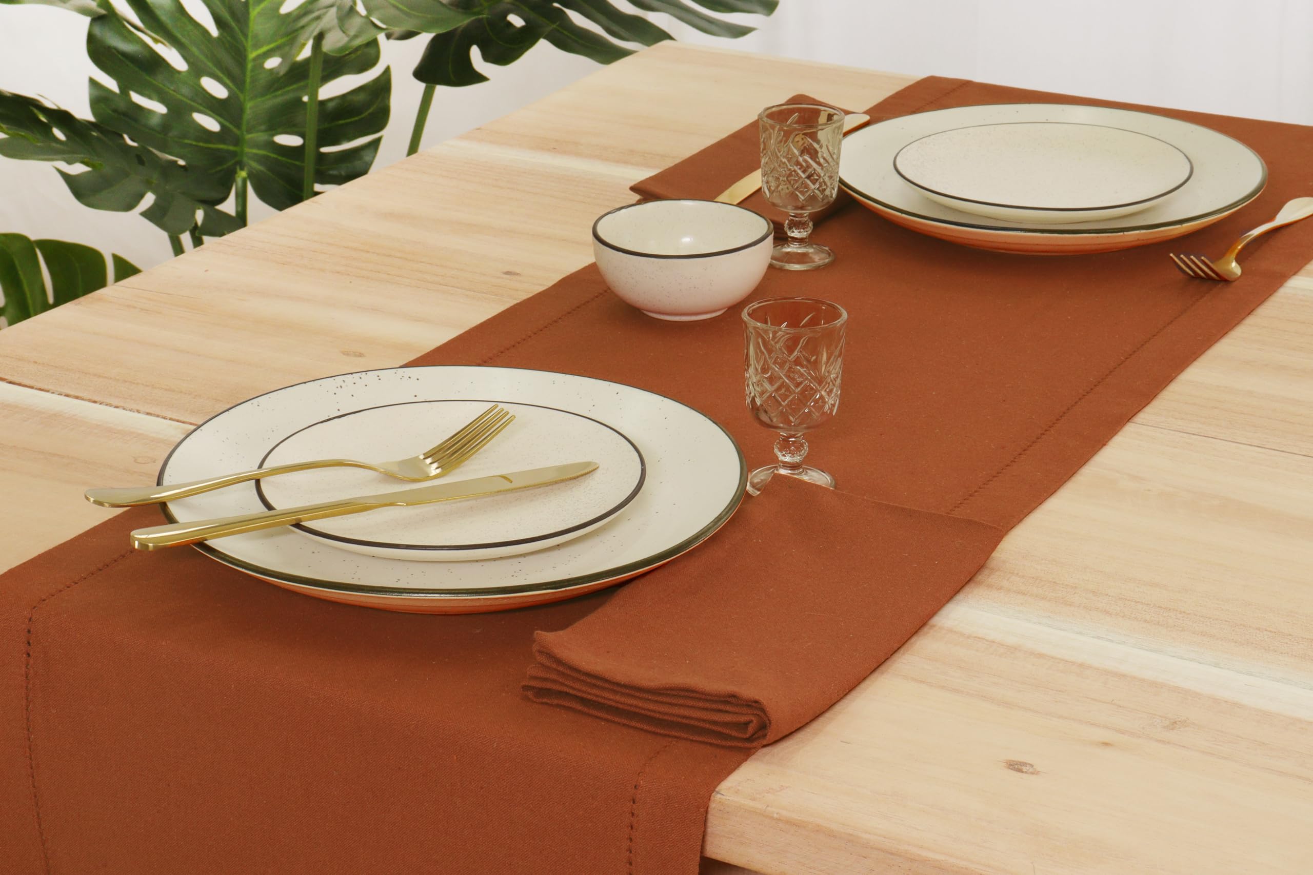 PurpleEssences rust napkins on fall table ideal for gatherings.