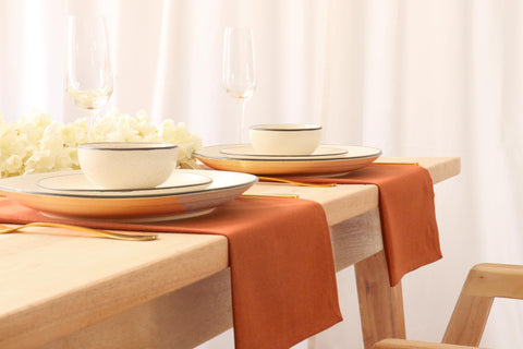 PurpleEssences rust napkins with refined hems add rustic elegance.