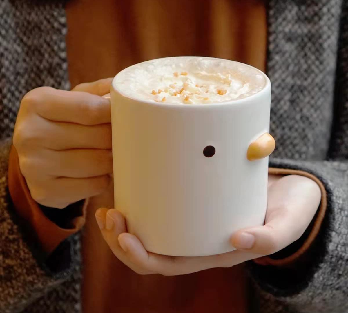 PURROOM yellow chick mug close up shows a matte ceramic finish