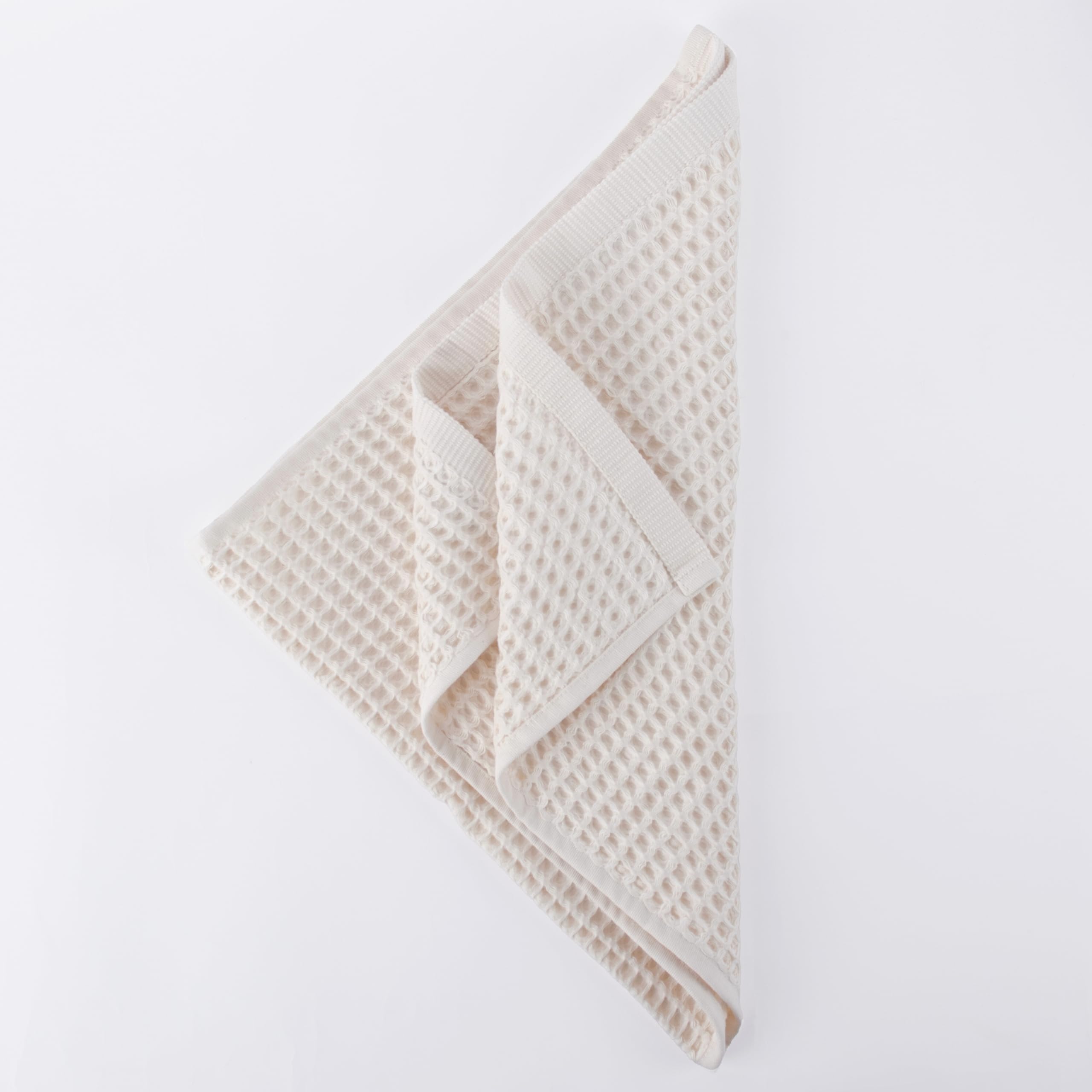 Püskül waffle kitchen towels lint-free for spotless drying.