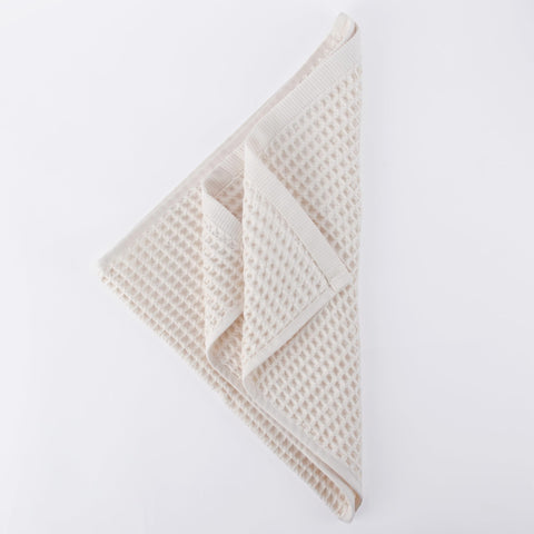 Püskül waffle kitchen towels lint-free for spotless drying.