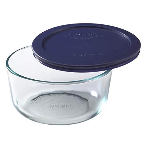 Pyrex 7200 dark blue lids stacked for compact, organized storage.