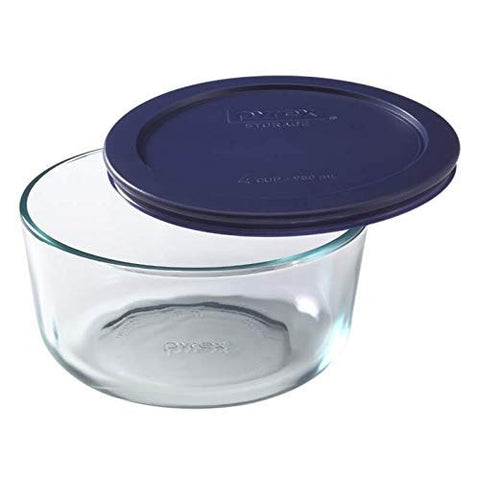 Pyrex 7200 dark blue lids stacked for compact, organized storage.