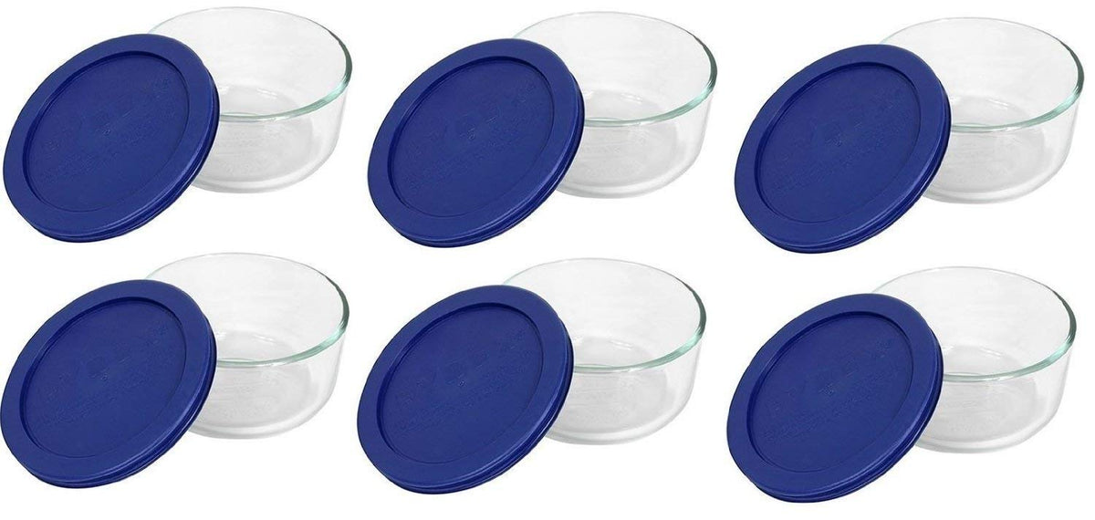 Pyrex 7200 two-cup glass bowl with blue lid for versatile storage.