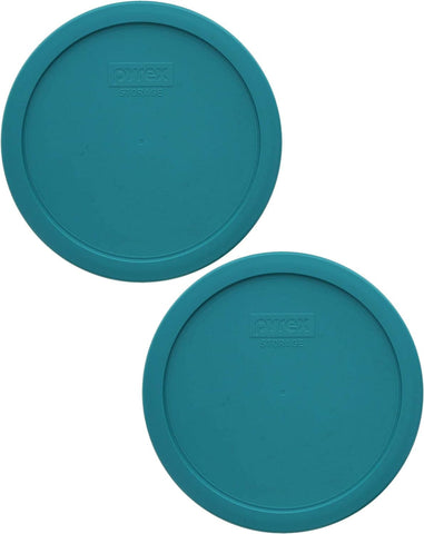 Pyrex turquoise lid on 7-cup bowl, secure fit for fridge storage.