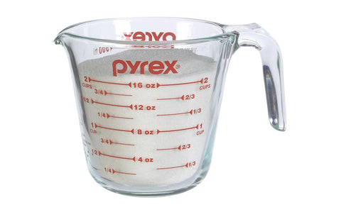 Pyrex Prepware clear glass showing measurement labels for quick reading.