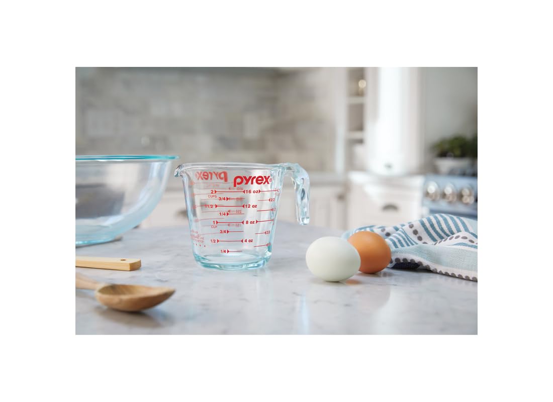 Pyrex Prepware measuring cup with pour spout for controlled liquids.