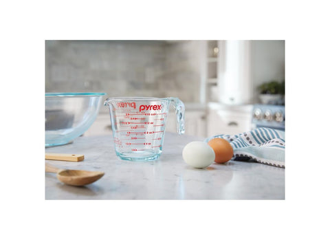 Pyrex Prepware measuring cup with pour spout for controlled liquids.