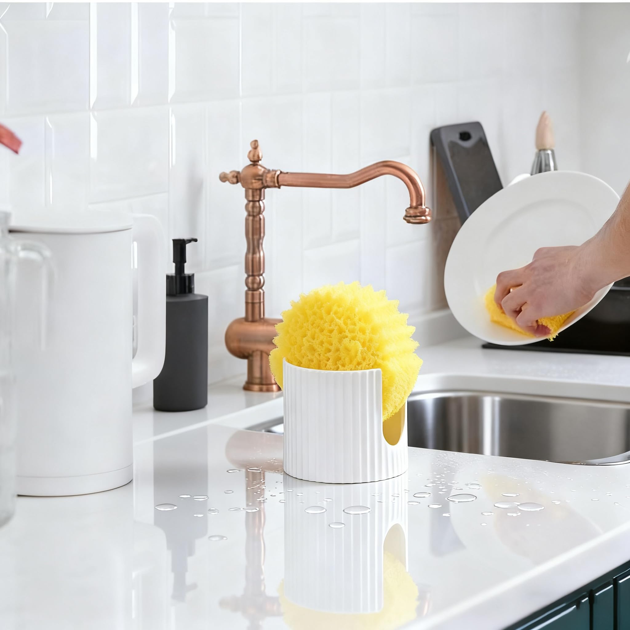 Weighted base prevents tipping for wet sponges on counters.