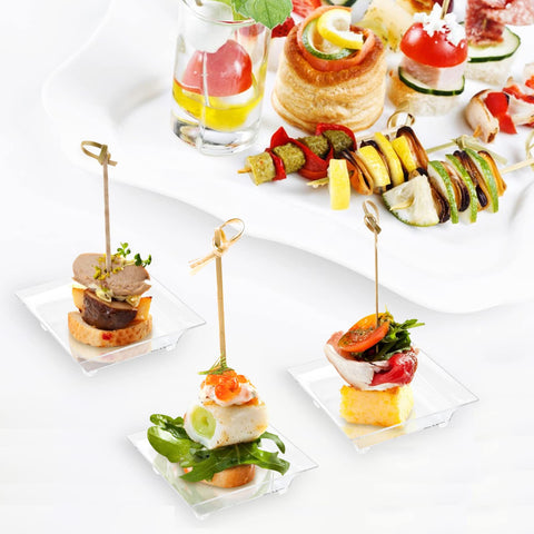 Qeirudu catering-use scene shows desserts neatly presented.