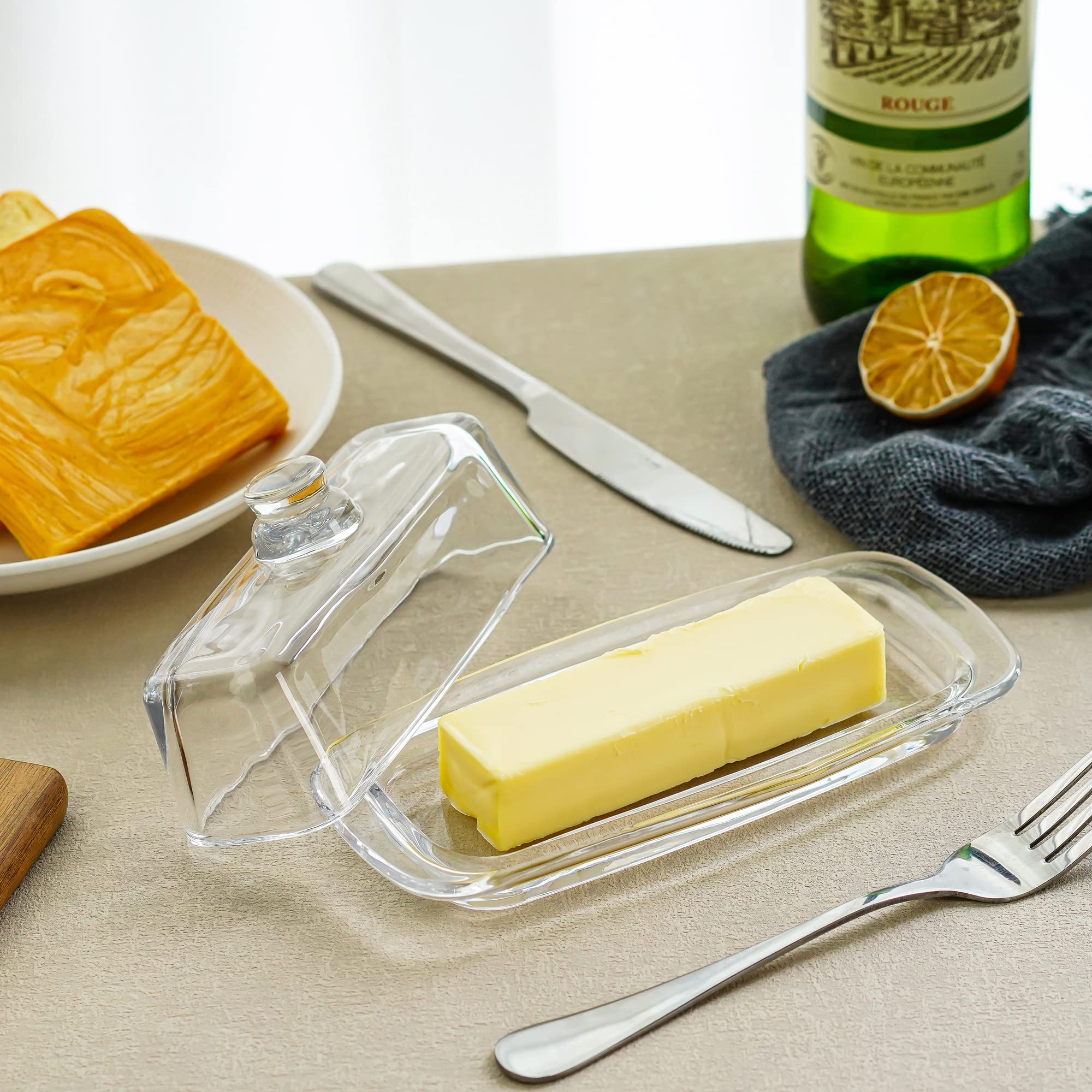 QFkris modern art style butter dish adds stylish flair to kitchen.