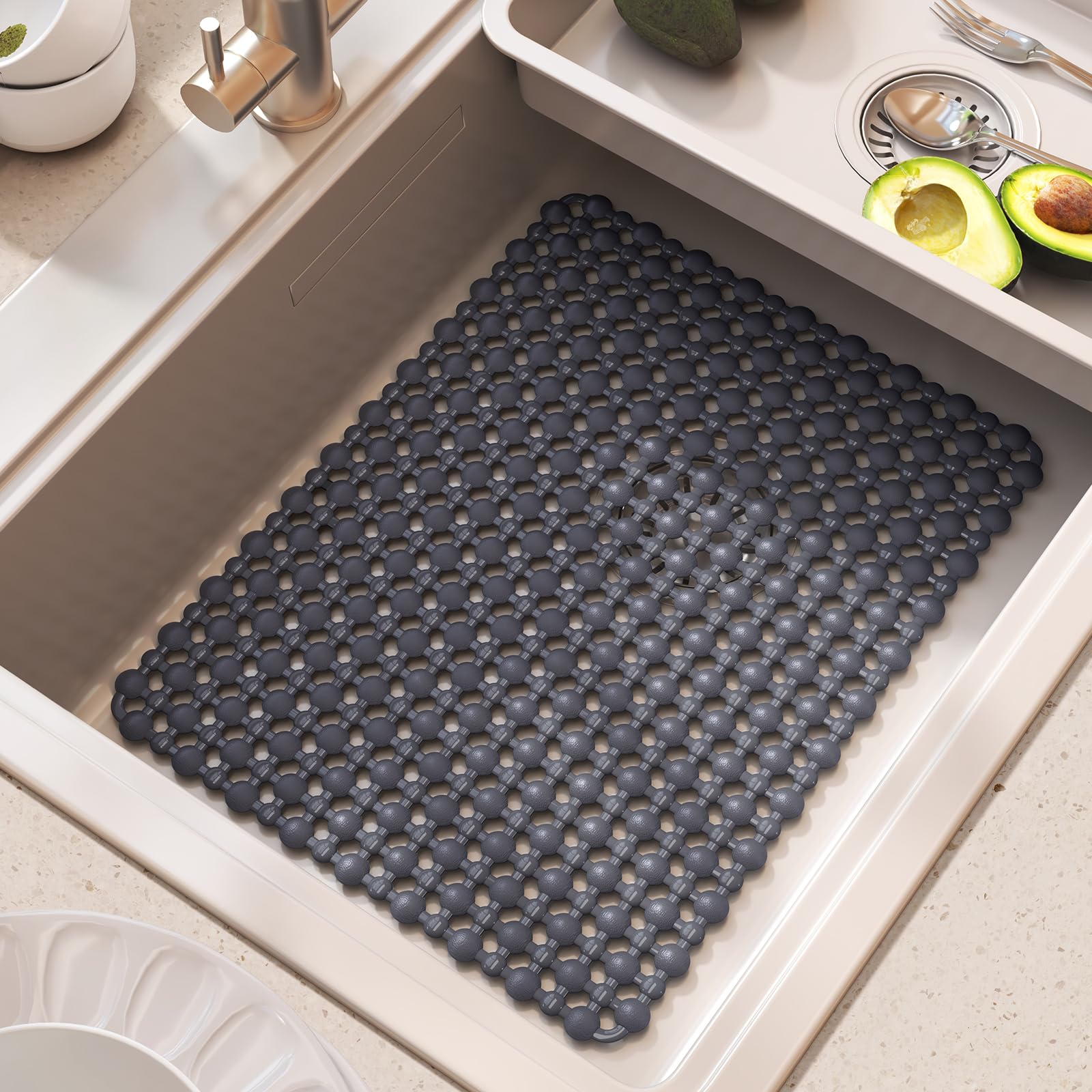 QiCaiJia sink mat sits firmly on the sink bottom, protecting surfaces from scratches.