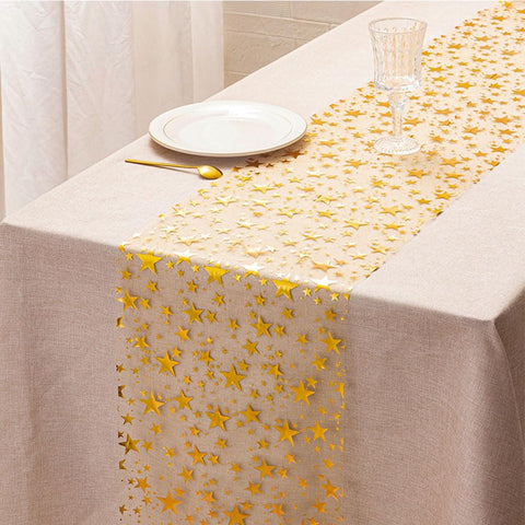 QILANJO gold bling star table runner close-up glitter highlights shimmering detail.