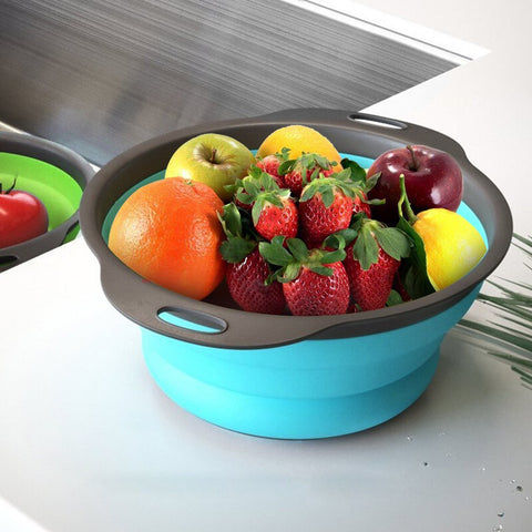 QiMH collapsible colander over sink for easy rinsing.