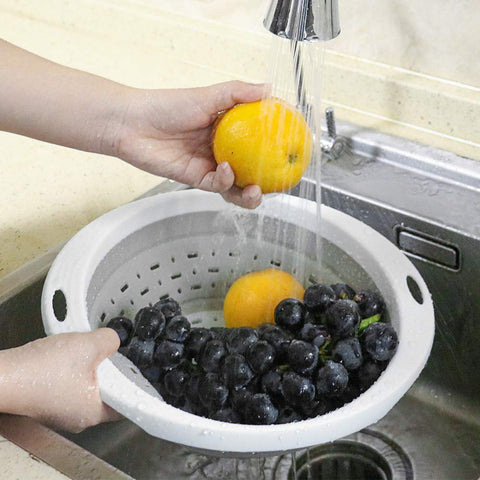 QiMH space-saving collapsible strainer stores flat in small kitchens.