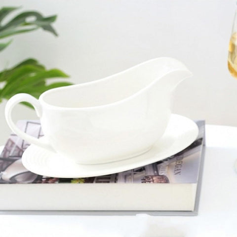 Qlans stain-resistant ceramic gravy boat keeps table clean during service
