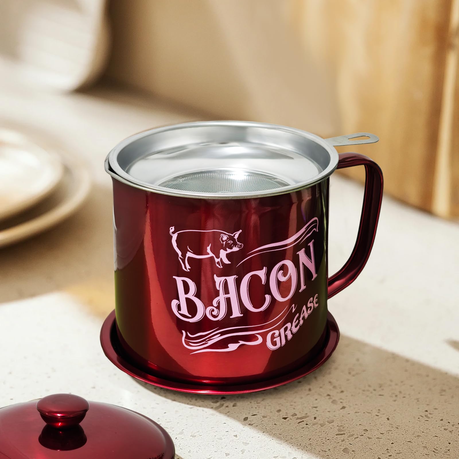 QMET curved handle keeps hands cool while pouring bacon grease.