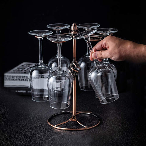 QPIX DIGITAL bronze stemware stand adds refined display to kitchen decor.