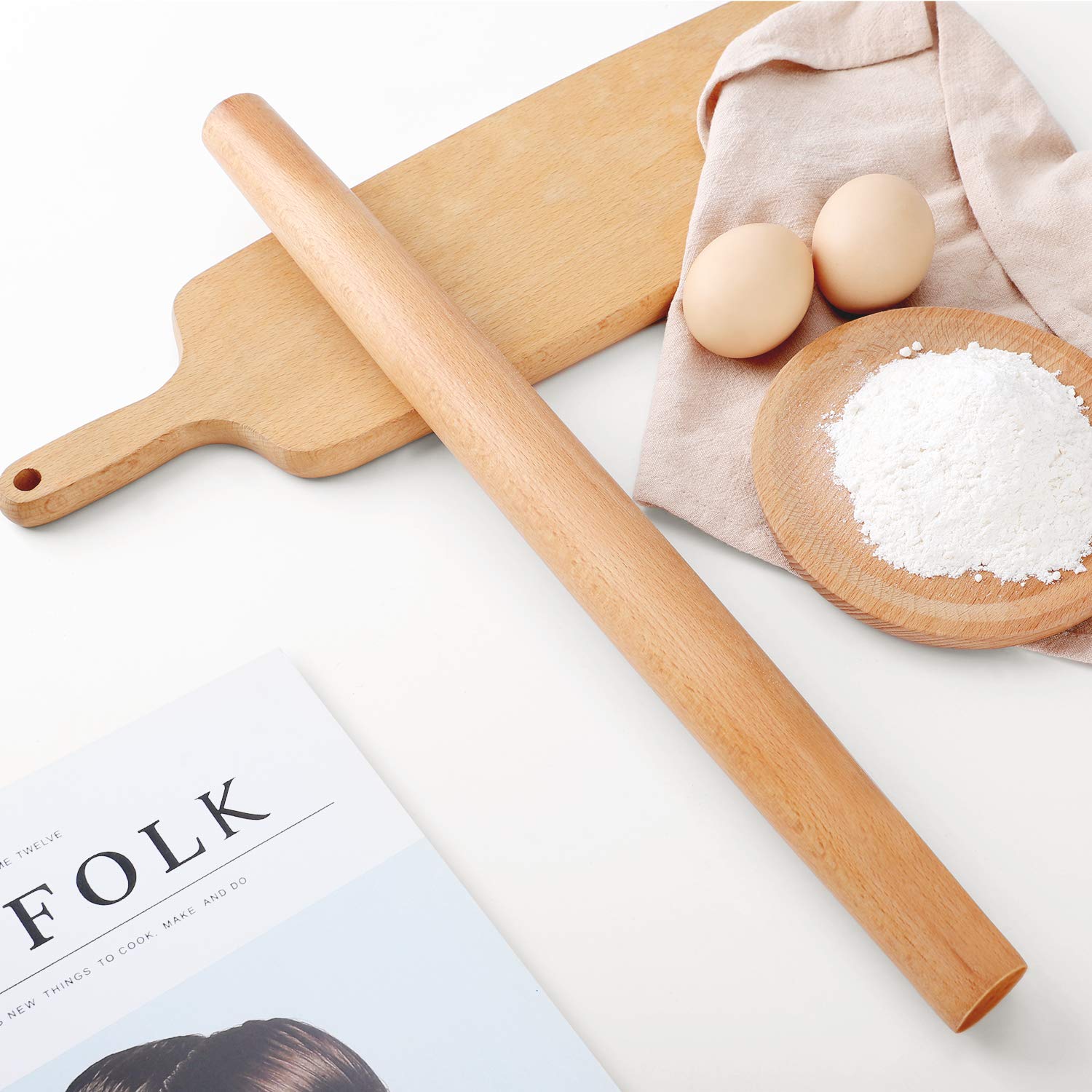 QUELLANCE rolling pin easy-clean surface helps wipe away flour residues.