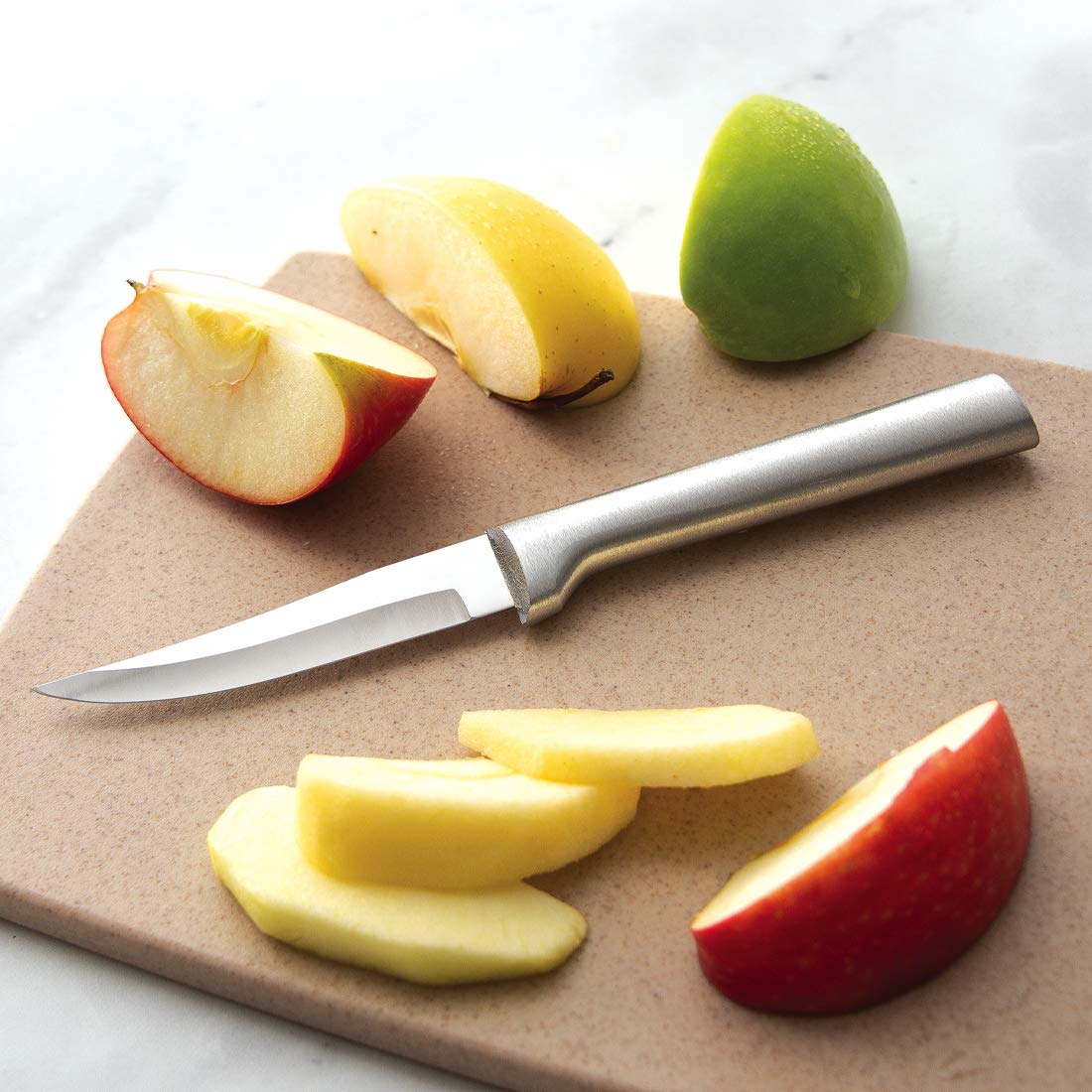 RADA vegetable peeler close-up shows hollow ground blade for effortless slicing.