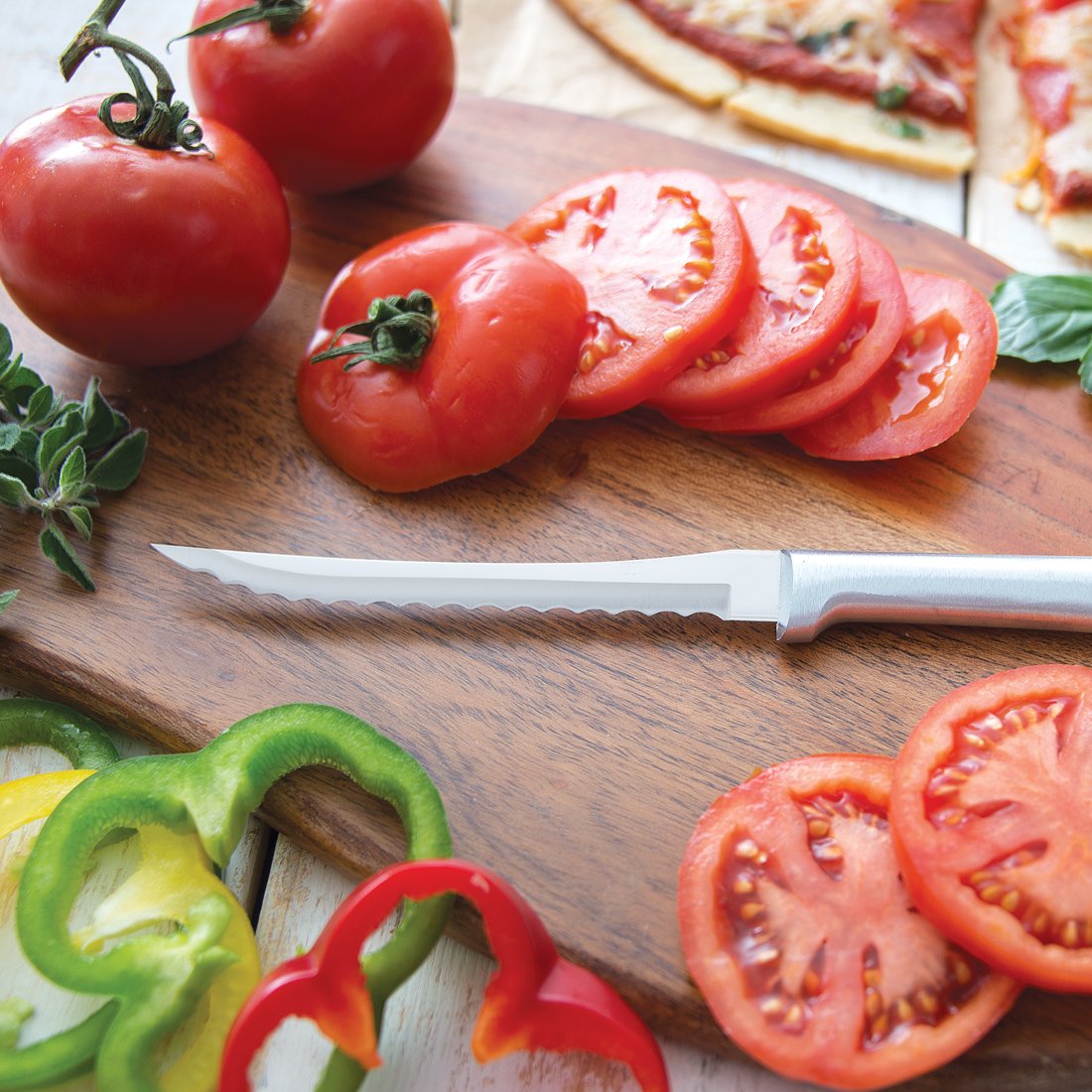 Rada Tomato Slicer in oak block set for thin, uniform tomato slices.