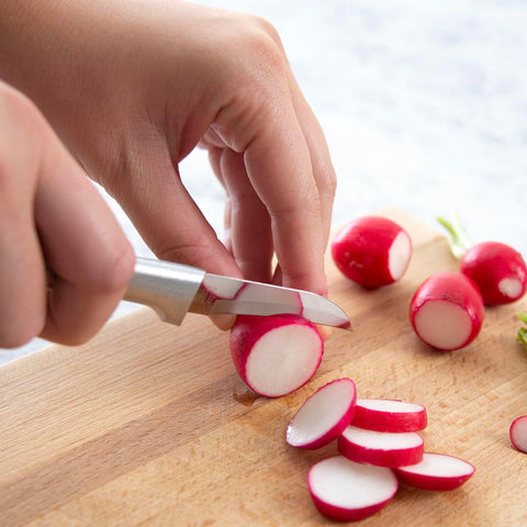 Rada Granny Paring Knife hollow-ground edge enables smooth slicing.