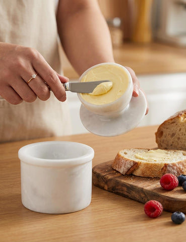 Radicaln butter crock water-seal demonstrates practical freshness for kitchen tasks.