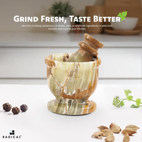 Radicaln marble mortar and pestle green closeup highlights texture.