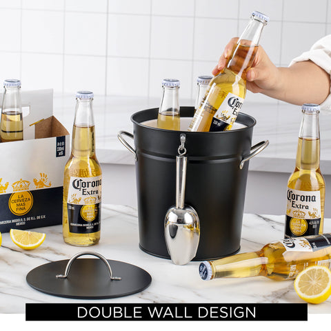 Rae Dunn ice bucket with handle enables easy transport between indoor and outdoor entertaining.