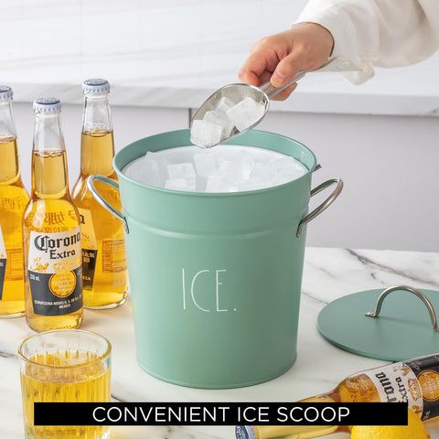 Rae Dunn sage ice bucket full on table at a party.