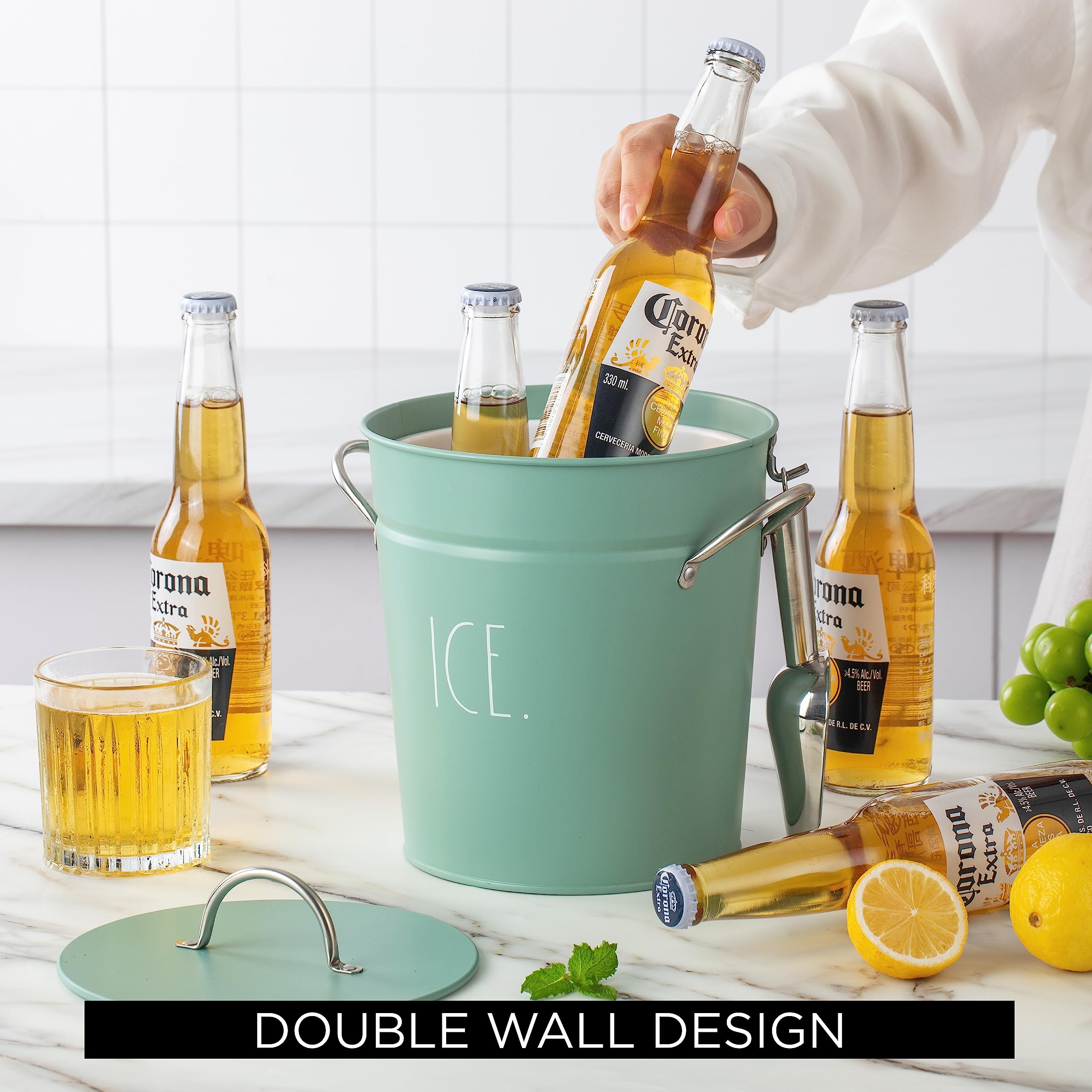 Rae Dunn outdoor picnic scene with sage ice bucket for gatherings.