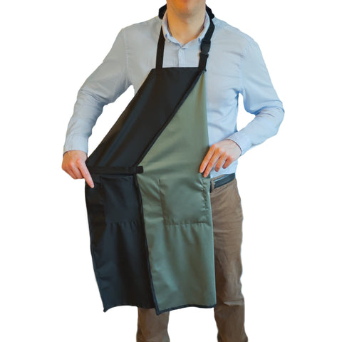 Ravill waterproof apron front view showing sleek black design for heavy tasks