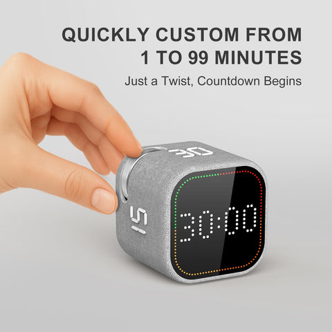 REACHER timer cube dial closeup showing adjustable countdown range