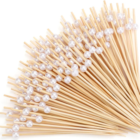 Reallnaive pearl cocktail picks with bamboo shaft for elegant appetizers.