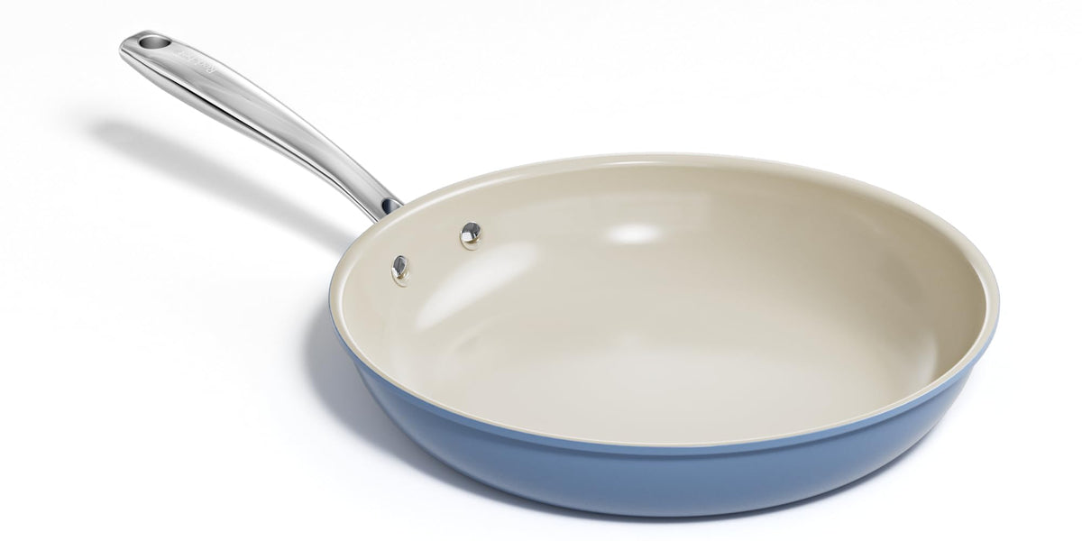 Redchef 11-inch blue ceramic nonstick pan for easy food release.