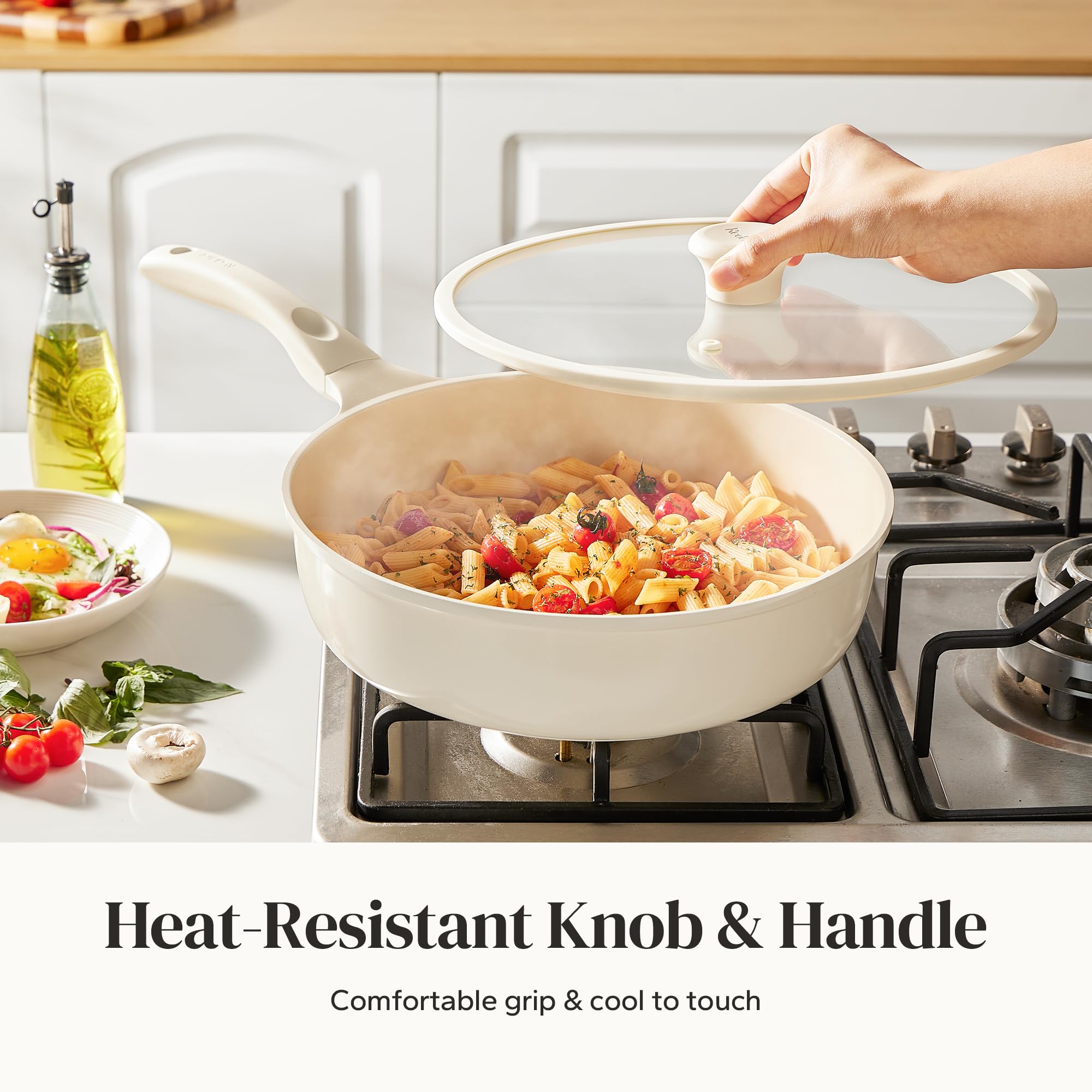 Redchef ergonomic handle close-up, stay-cool grip for comfortable lifting and pouring.