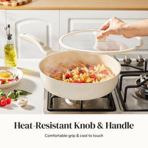 Redchef ergonomic handle close-up, stay-cool grip for comfortable lifting and pouring.