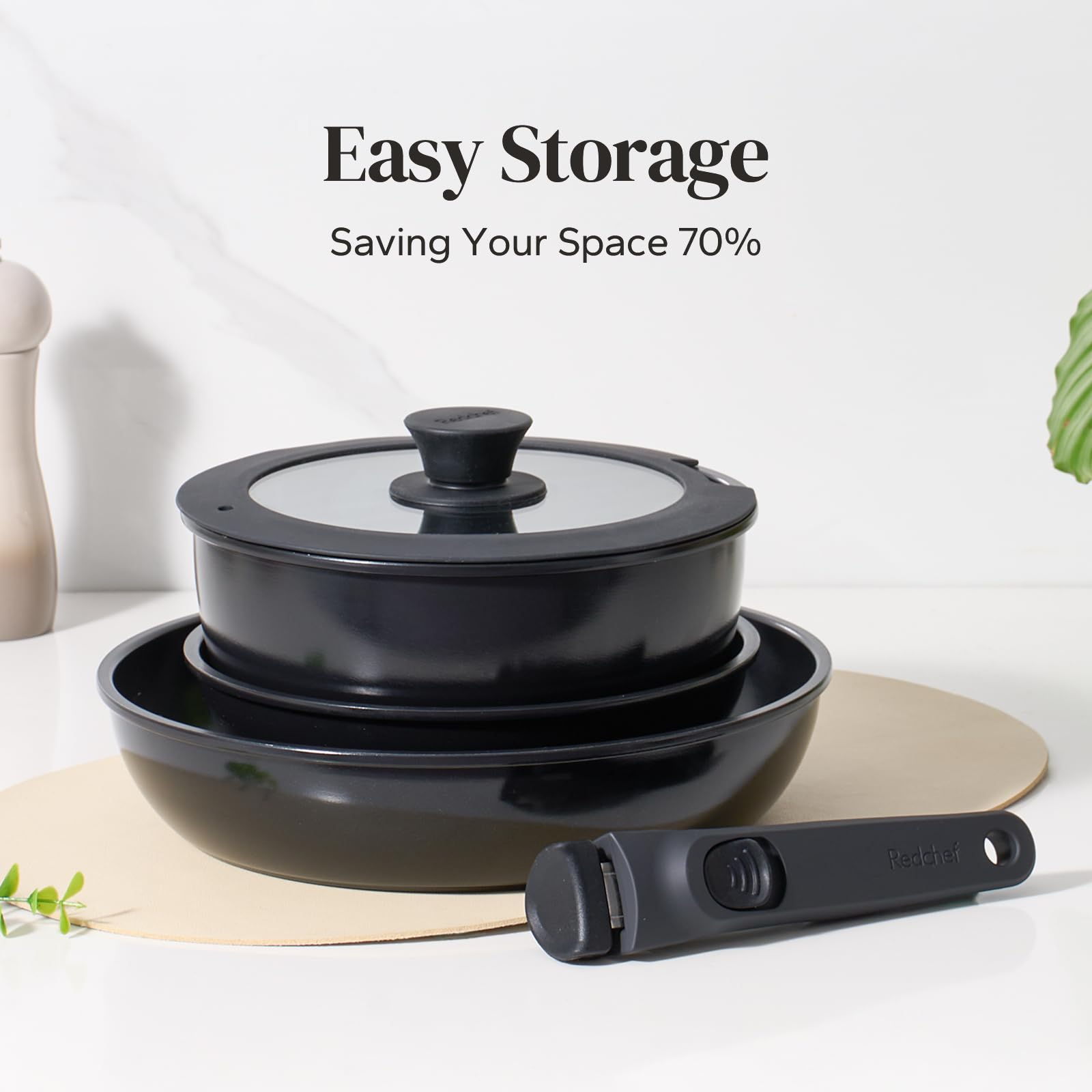 Redchef detachable handle showing universal fit for various cookware.