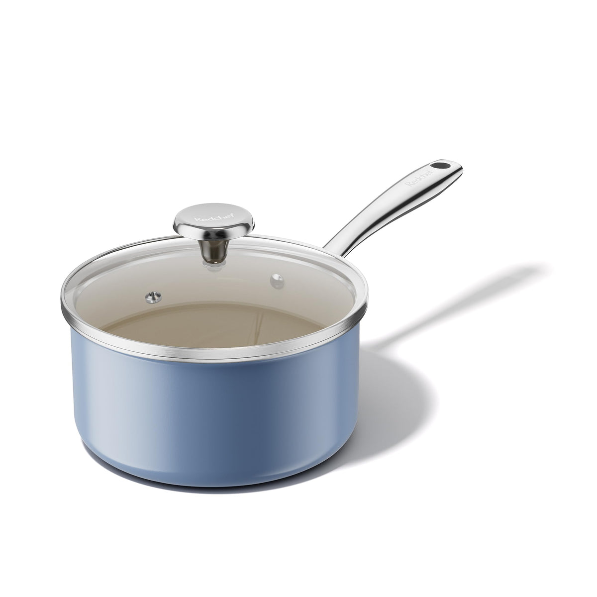 Redchef blue sauce pan with lid for easy simmering and moisture retention.