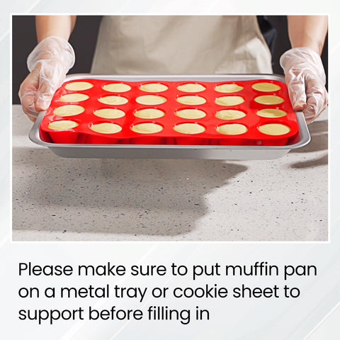 Redfly two-pack muffin pan on baking sheet for stable baking.