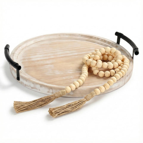 Relaxing Garden decorative round tray with bead garland adds texture for a cozy coffee table focal point.