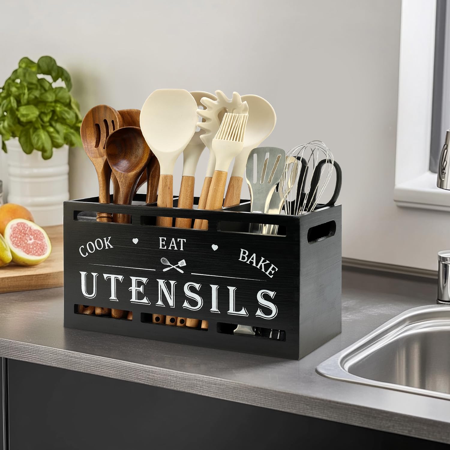 Renawe extra-large black wood utensil holder mounted on the wall with hooks for space-saving access.