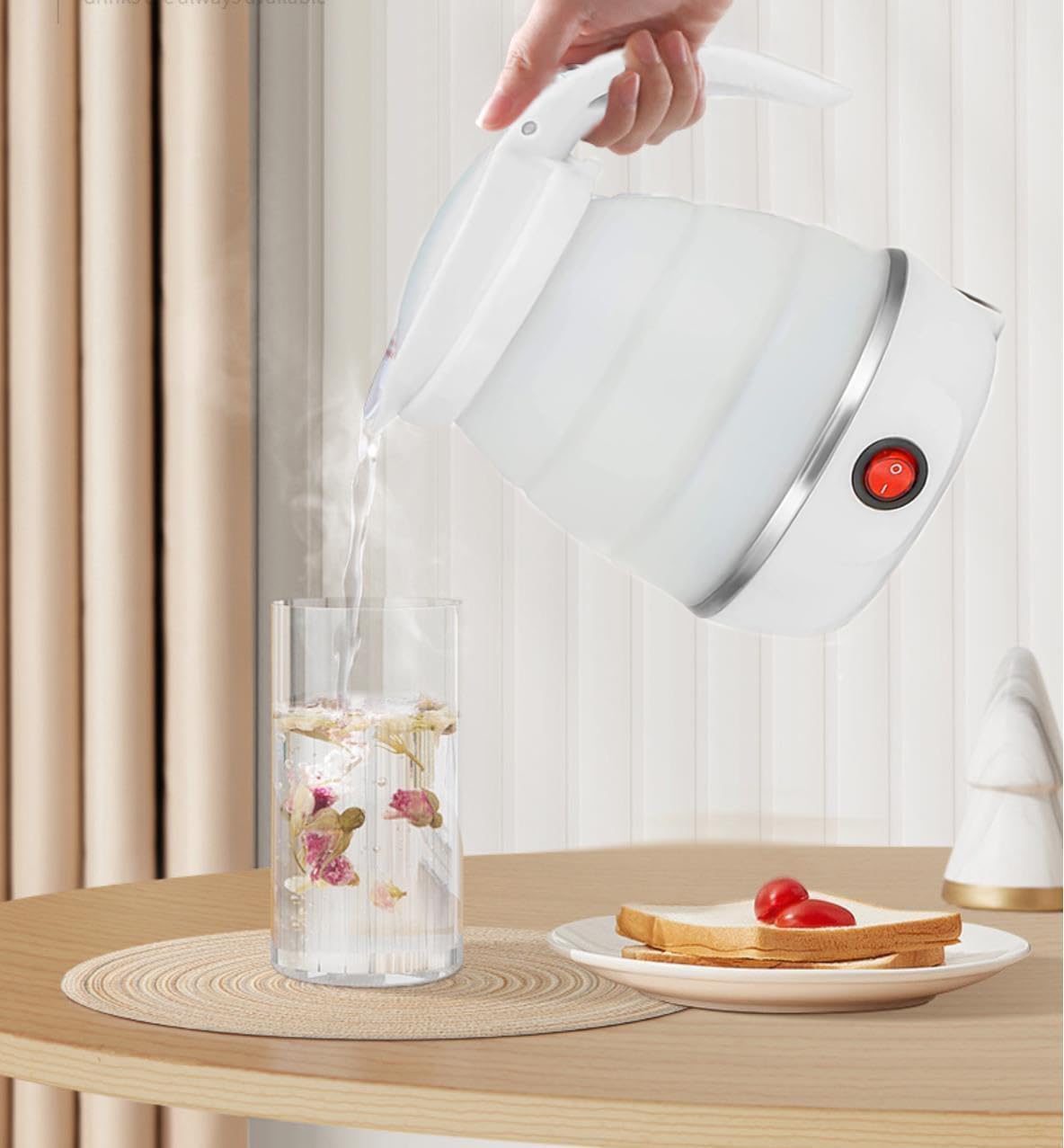 Resgitiati travel kettle silicone body for safe, durable daily use.